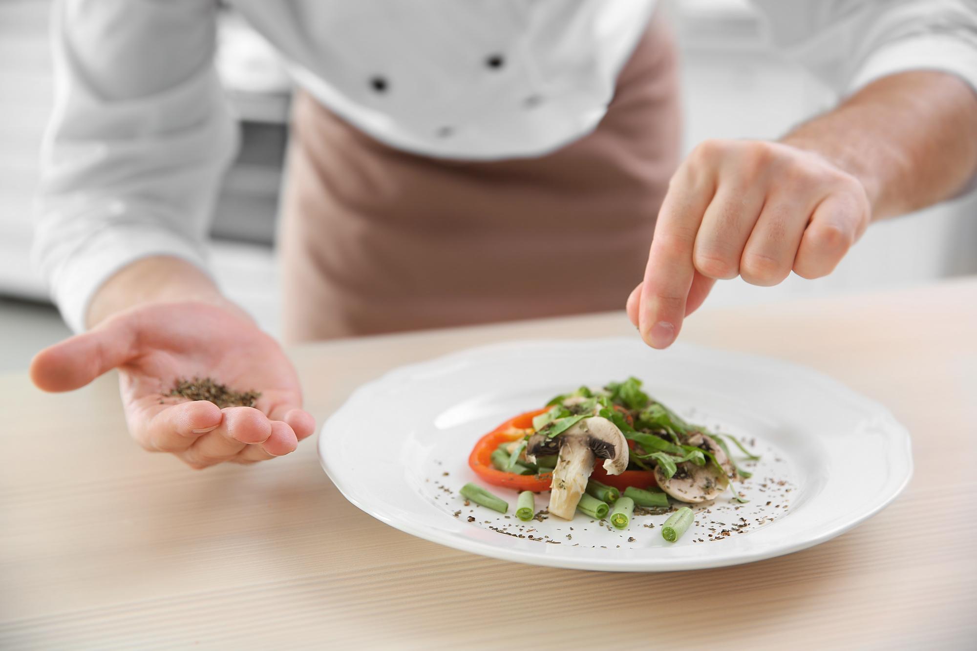 Chef preparing quick meal in modern kitchen